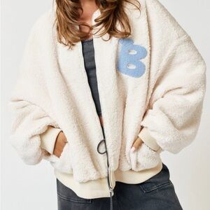 Cream Teddy Jacket with Blue Patch